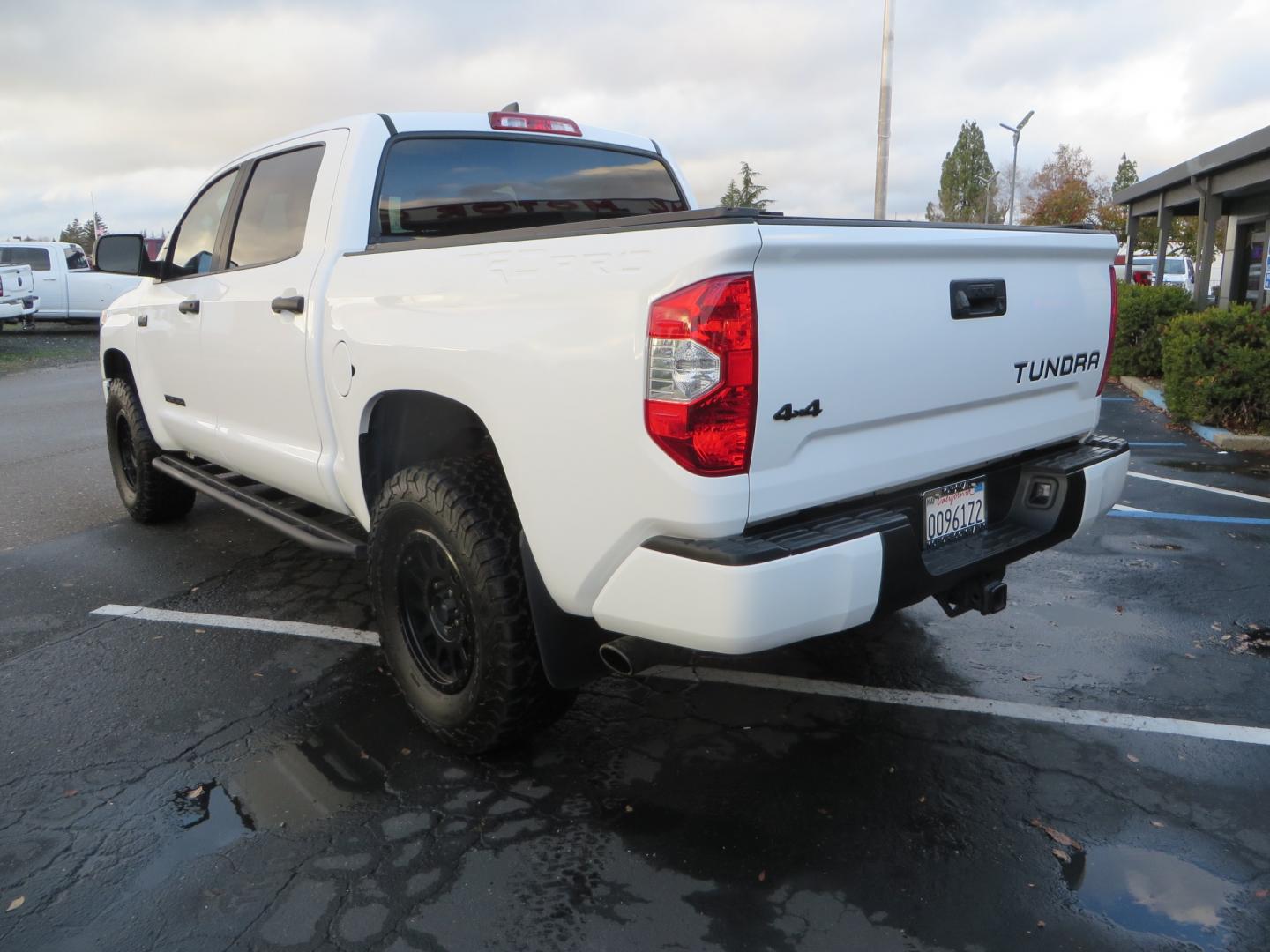 2020 White /BLACK Toyota Tundra SR5 5.7L V8 CrewMax 4WD (5TFDY5F12LX) with an 5.7L V8 DOHC 32V engine, 6A transmission, located at 2630 Grass Valley Highway, Auburn, CA, 95603, (530) 508-5100, 38.937893, -121.095482 - Clean tundra featuring a level kit, Icon Vehicle Dynamicxs upper control arms, 18" Method NV wheels, 35" BFG KO2 tires, Rocksliders, Retrax bedcover, Rigid Industries fog lights, RoadActive Suspension Custom Leaf Spring Enhancement Kit. - Photo#6